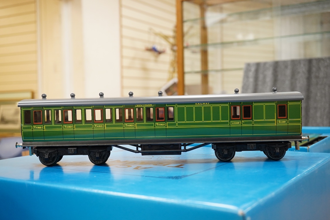 A boxed ACE Trains 0 gauge tinplate coach set; C/1 SR, comprising of three Southern Railway bogie coaches; a Full First, a Full Third and a Brake Third